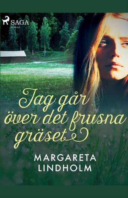 Jag går över det frusna gräset