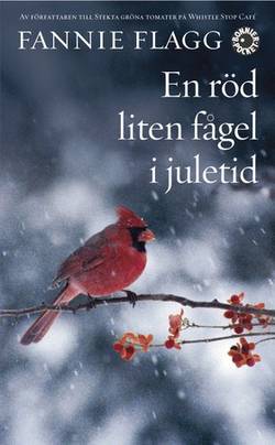 En röd liten fågel i juletid