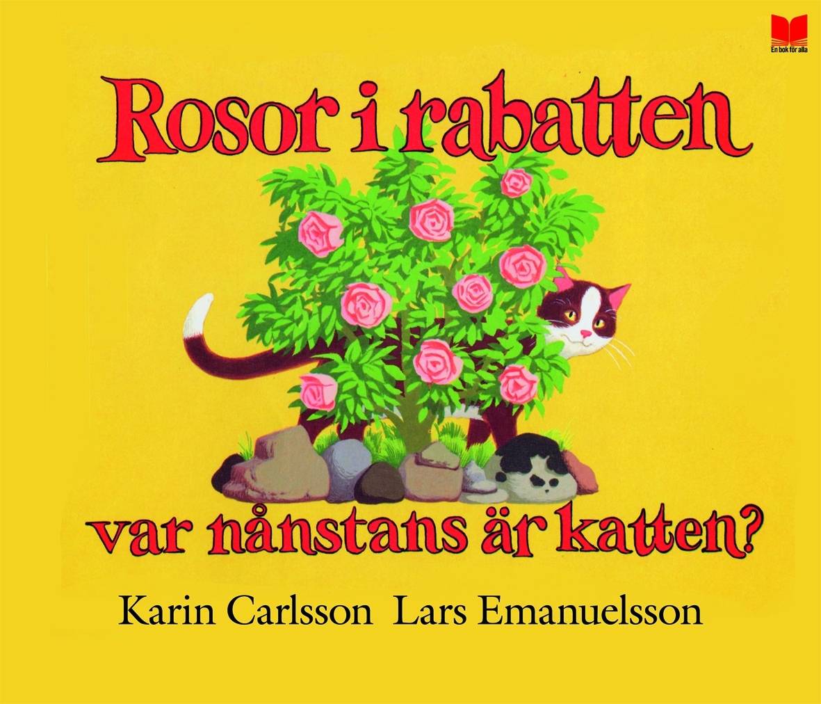 Rosor i rabatten var nånstans är katten