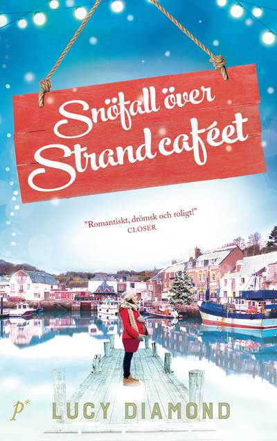 Snöfall över strandcaféet