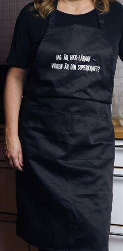 Förkläde: Jag är HKK-lärare – vad är din superkraft? (svart)